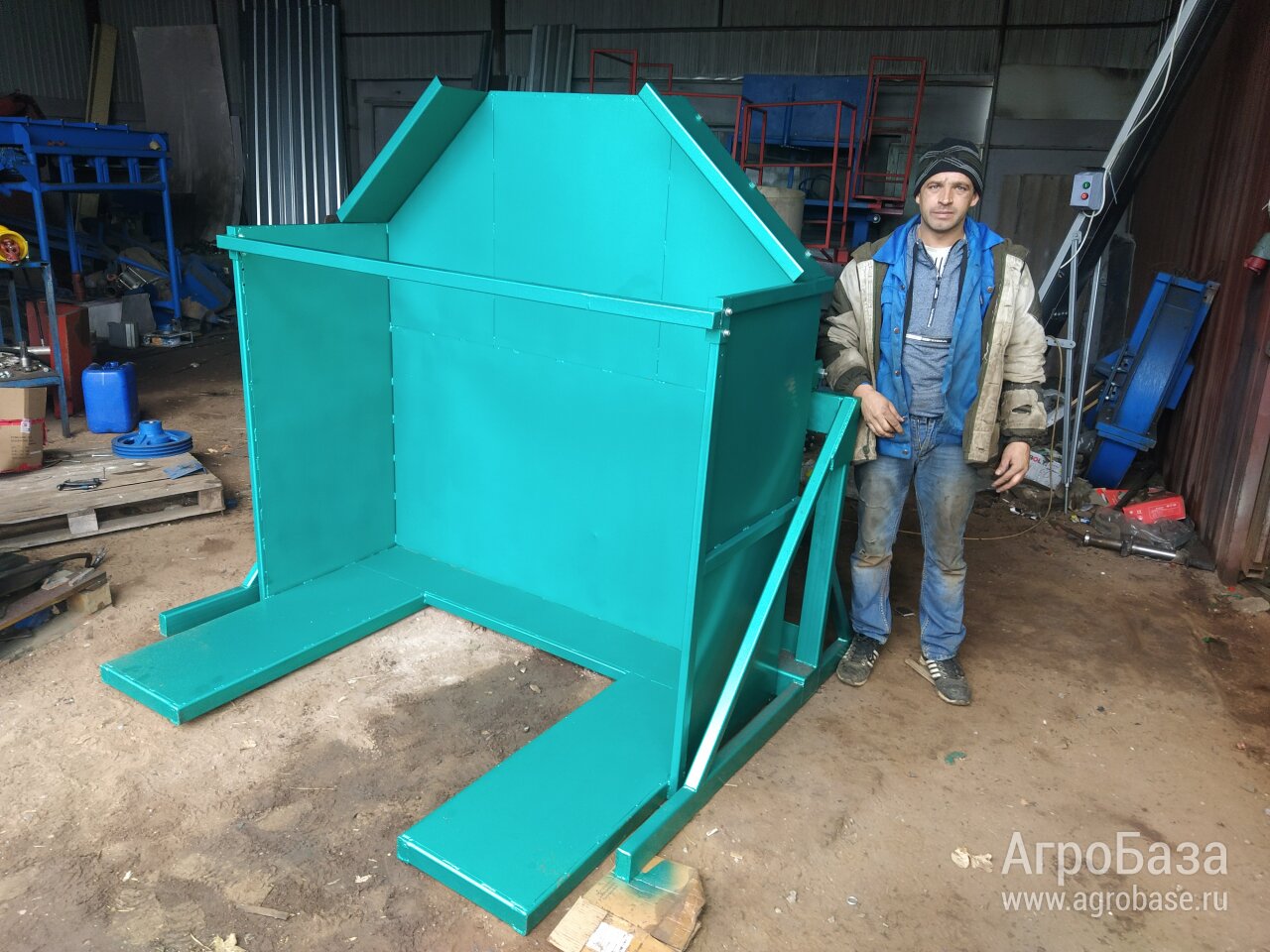 Опрокидыватель контейнера