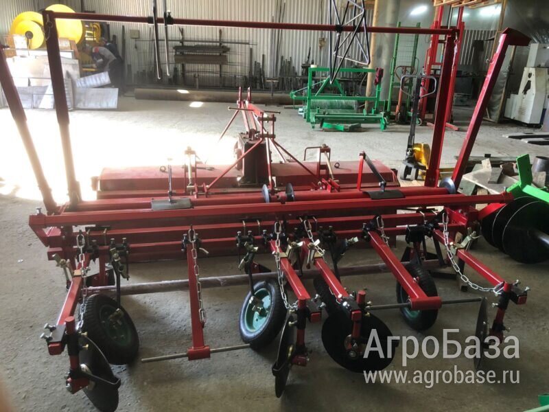 Пленкоукладчик двухрядный с почвофрезой